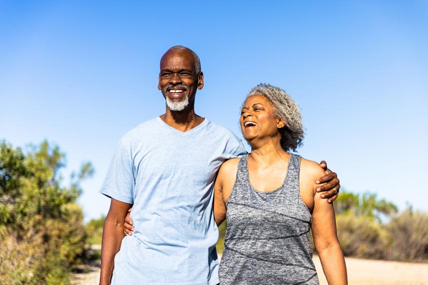 senior couple walking outside