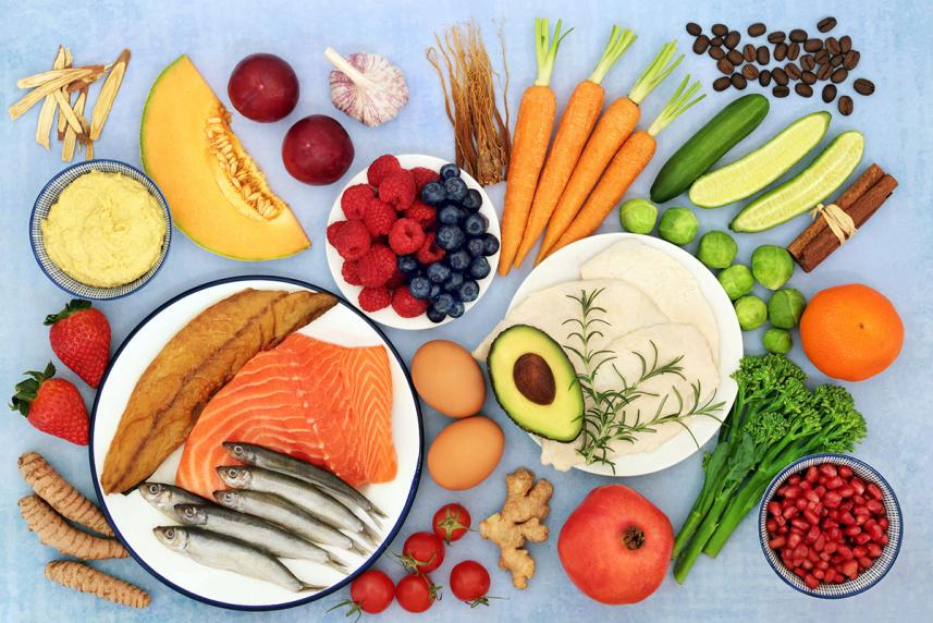 Variety of foods - fruits, vegetables, nuts and salmon