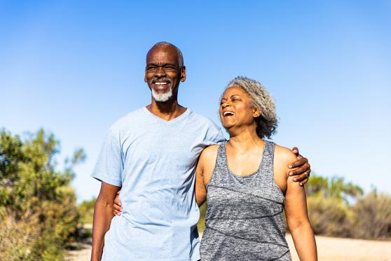 senior couple walking outside
